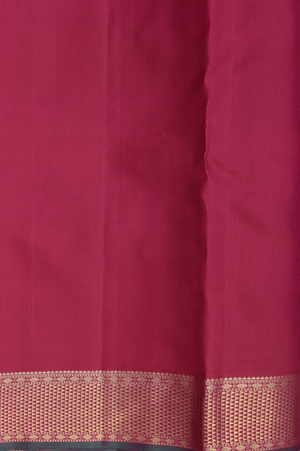 Kanchipuram Silk Saree In Plum Purple With Floral Buttas
