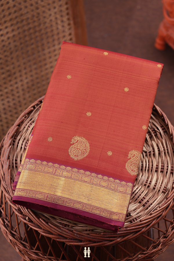 Kanchipuram Silk Saree In Coral Orange With Floral Buttis