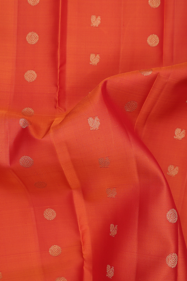 Kanchipuram Silk Saree In Orange With Peacock Buttas