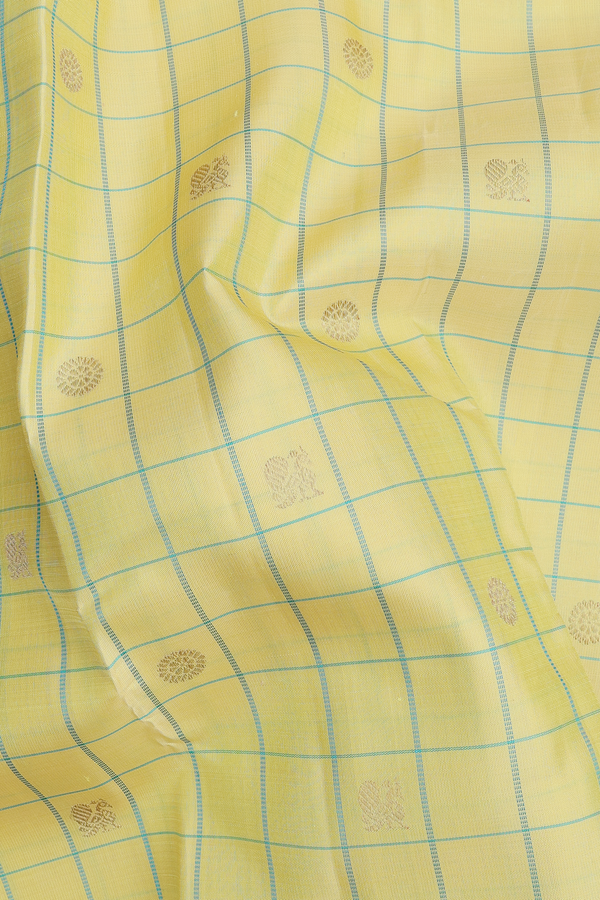 Kanchipuram Silk Saree In Light Yellow With Checks Design