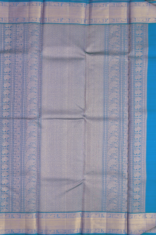 Kanchipuram Silk Saree In Cerulean Blue With Peacock Buttas