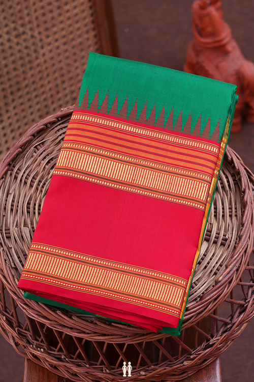 Kanchipuram Silk Saree In Green With Peacock Buttas