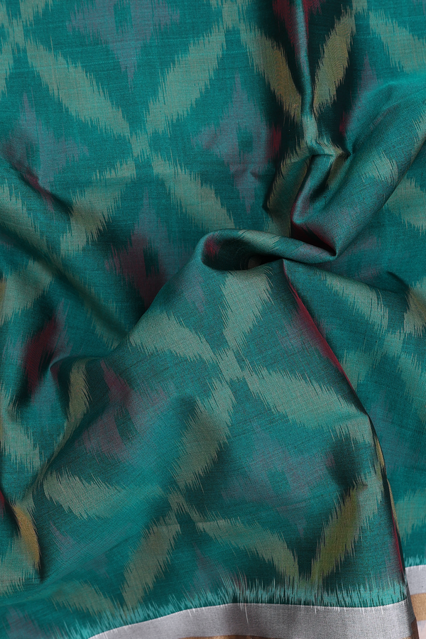 Kora Silk Cotton Saree In Teal Green With Ikat Design
