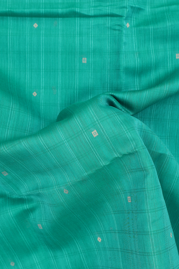 Kora Silk Cotton Saree In Green With Zari Buttis