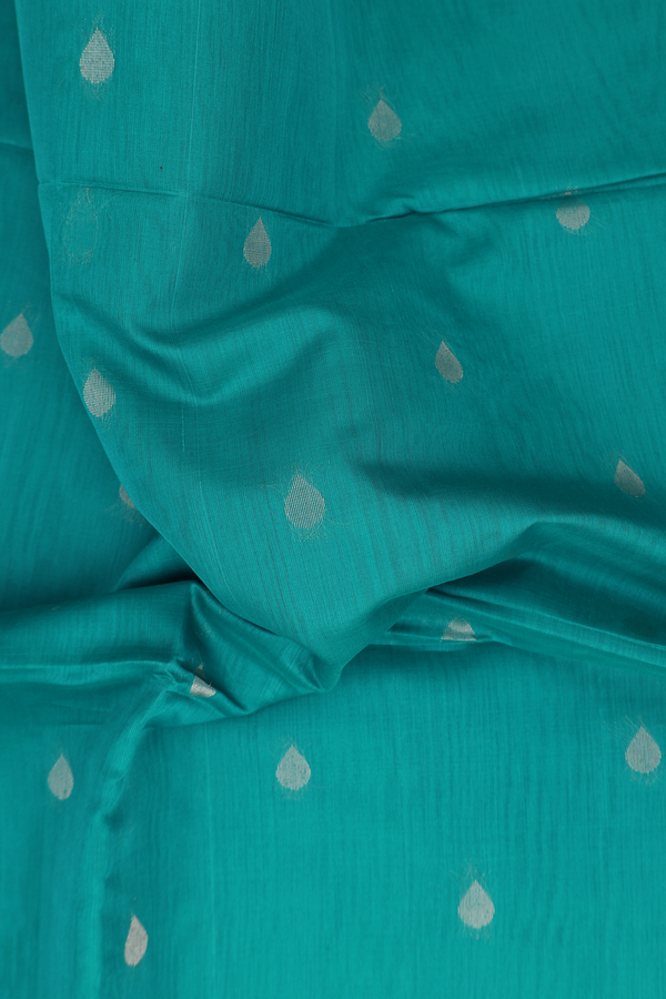 Kora Silk Cotton Saree In Greenish Blue With Thilagam Buttas