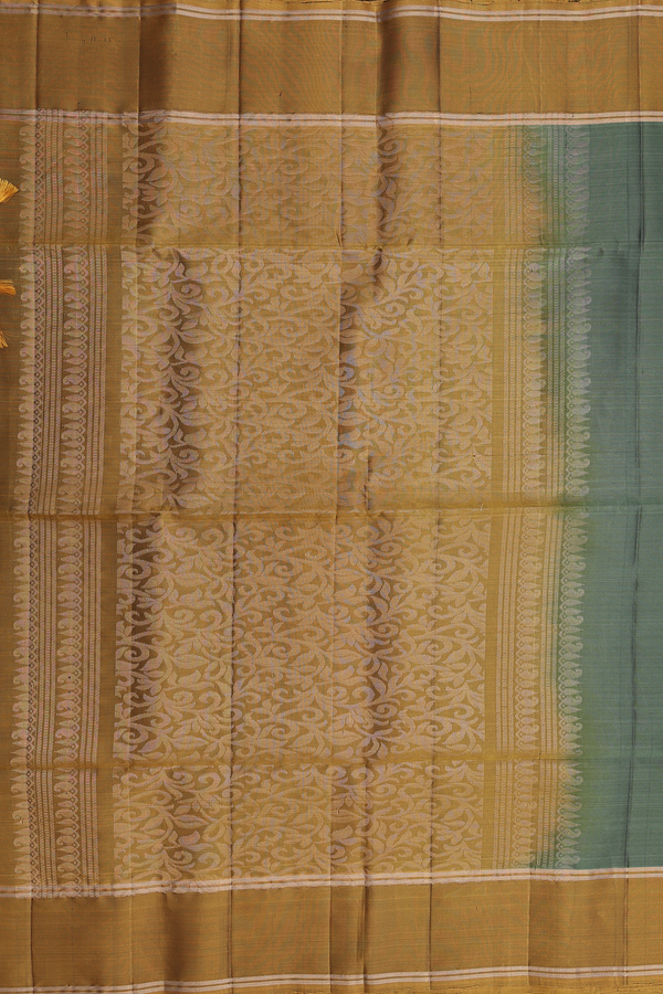 Soft Silk Saree In Green With Zari Buttas