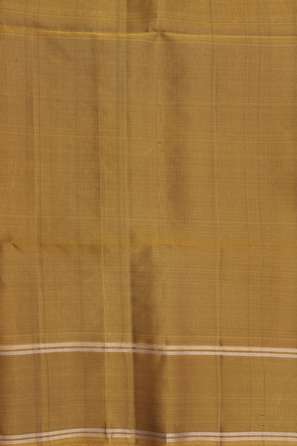 Soft Silk Saree In Green With Zari Buttas