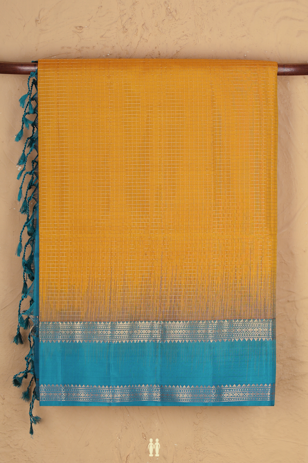 Soft Silk Saree In Saffron Yellow With Checks Design