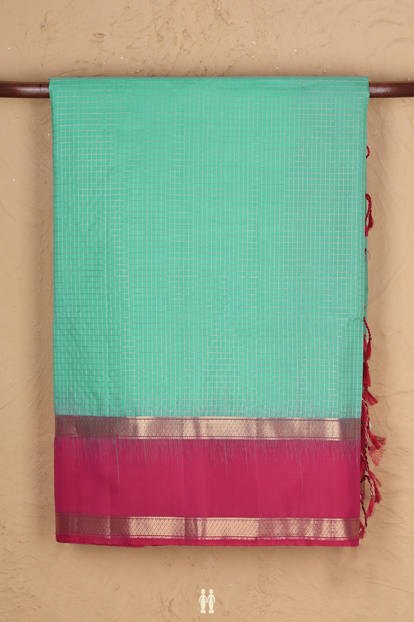 Soft Silk Saree In Tiffany Blue With Checks Design