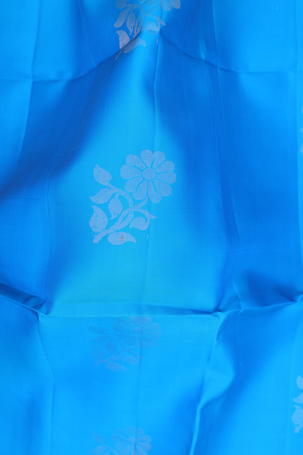 Soft Silk Saree In Deep Sky Blue With Floral Motifs