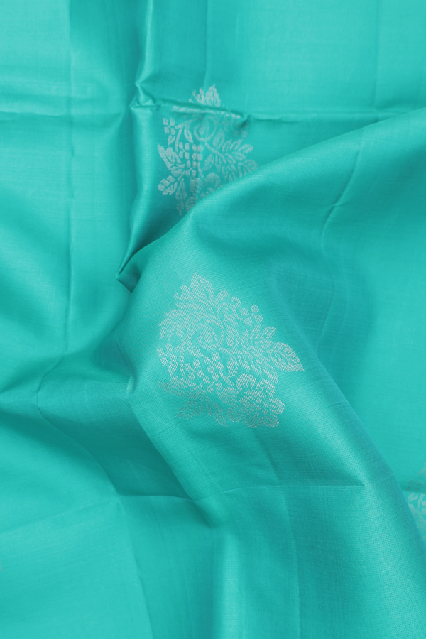 Soft Silk Saree In Tiffany Blue With Floral Motifs