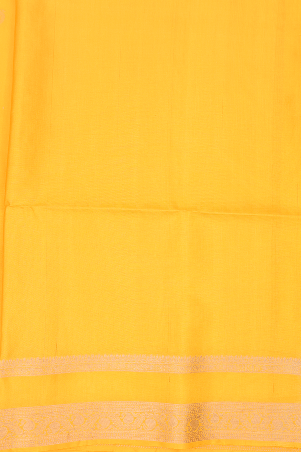 Soft Silk Saree In Bright Yellow With Peacock Buttas