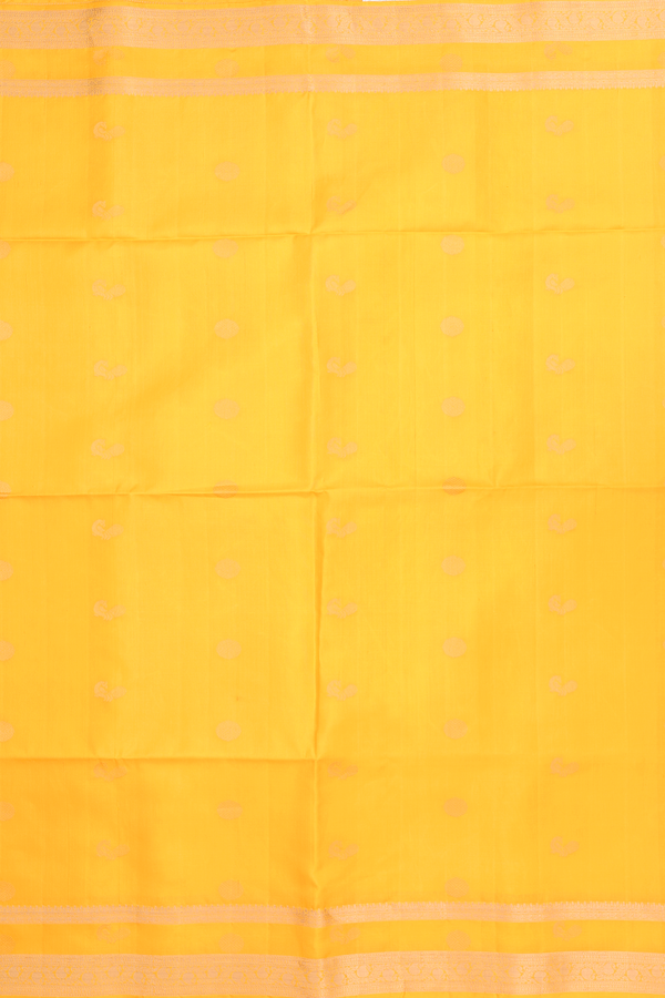 Soft Silk Saree In Bright Yellow With Peacock Buttas