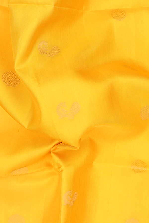 Soft Silk Saree In Bright Yellow With Peacock Buttas