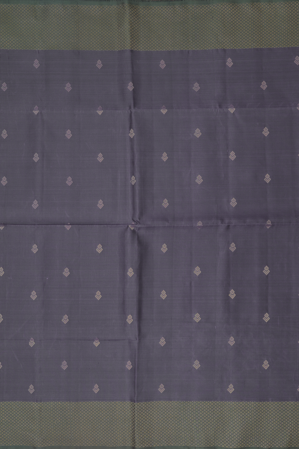 Soft Silk Saree In Dark Grey With Zari Buttas