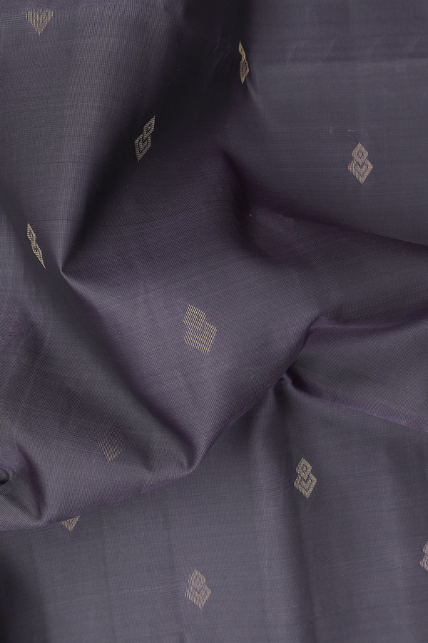 Soft Silk Saree In Dark Grey With Zari Buttas