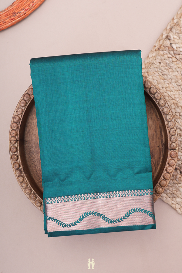 Kanchipuram Silk Saree In Teal Blue With Zari Border
