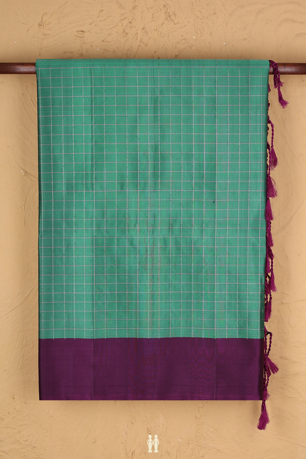 Soft Silk Saree In Jade Green With Checks Design