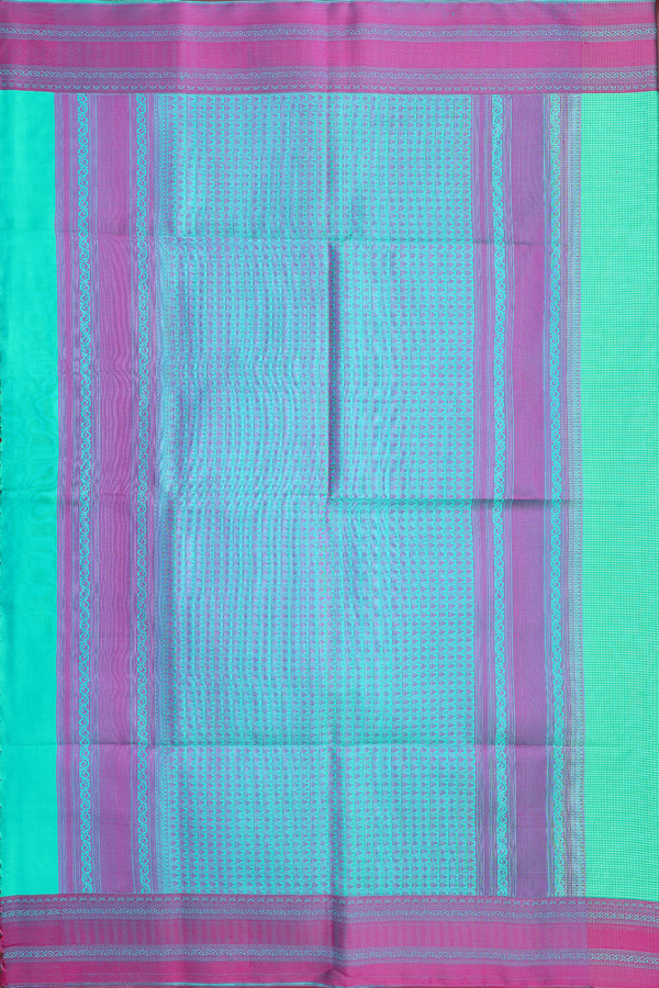 Soft Silk Saree In Shades Of Green With Checks Design