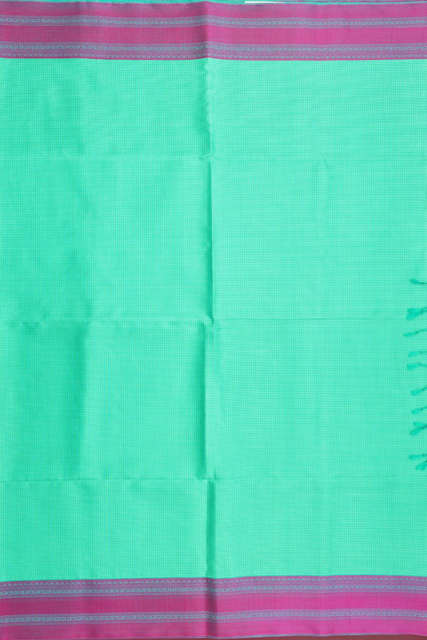 Soft Silk Saree In Shades Of Green With Checks Design