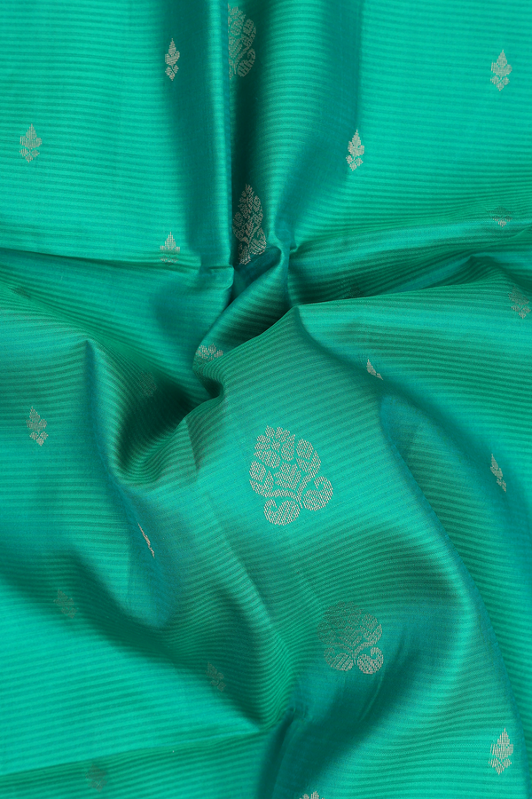 Soft Silk Saree In Aqua Green With Zari Buttas