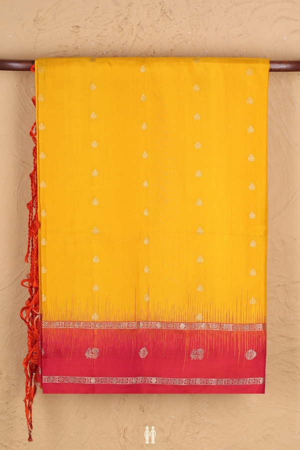 Soft Silk Saree In Saffron Yellow With Zari Buttas