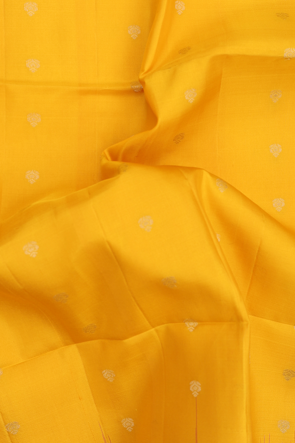 Soft Silk Saree In Saffron Yellow With Zari Buttas