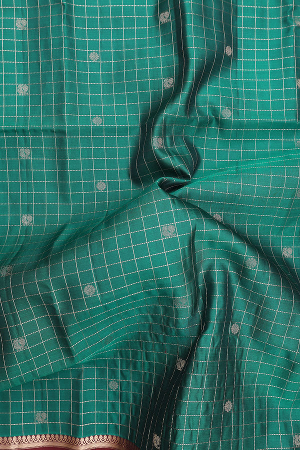 Soft Silk Saree In Peacock Green With Checks Design
