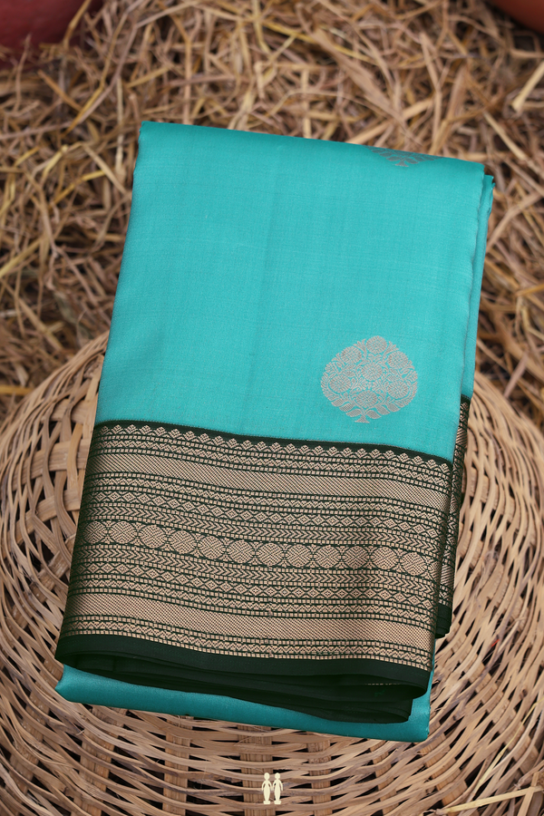 Kanchipuram Silk Saree In Turkish Blue With Tree Buttas