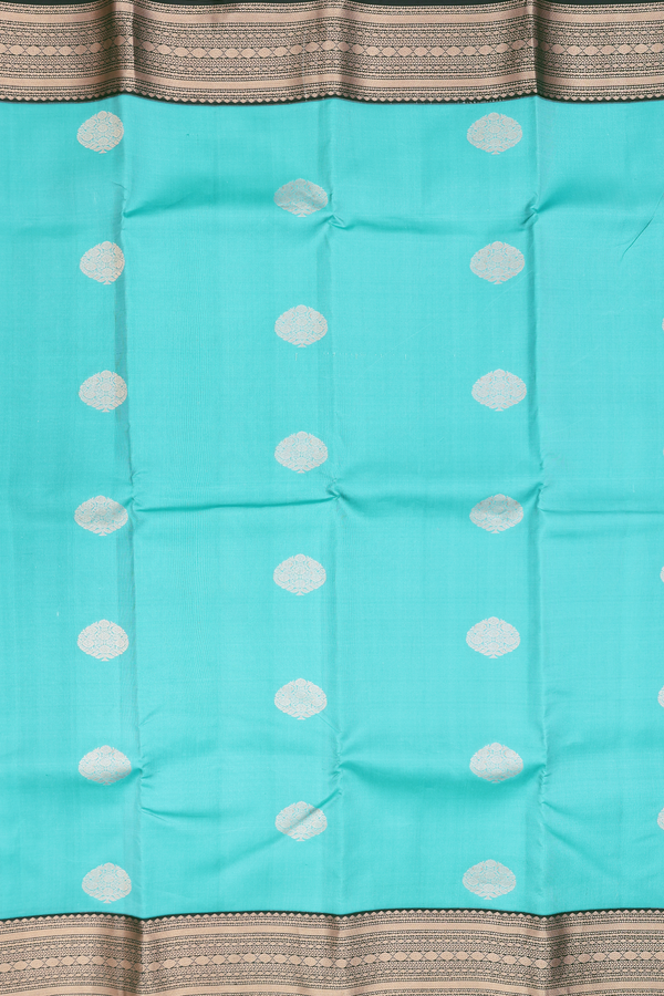 Kanchipuram Silk Saree In Turkish Blue With Tree Buttas