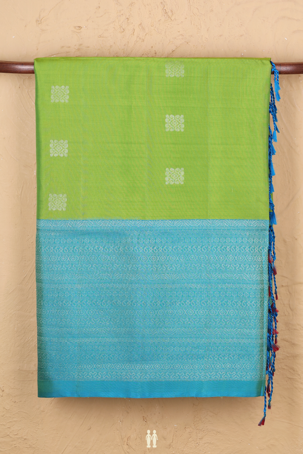 Soft Silk Saree In Parrot Green With Zari Buttas