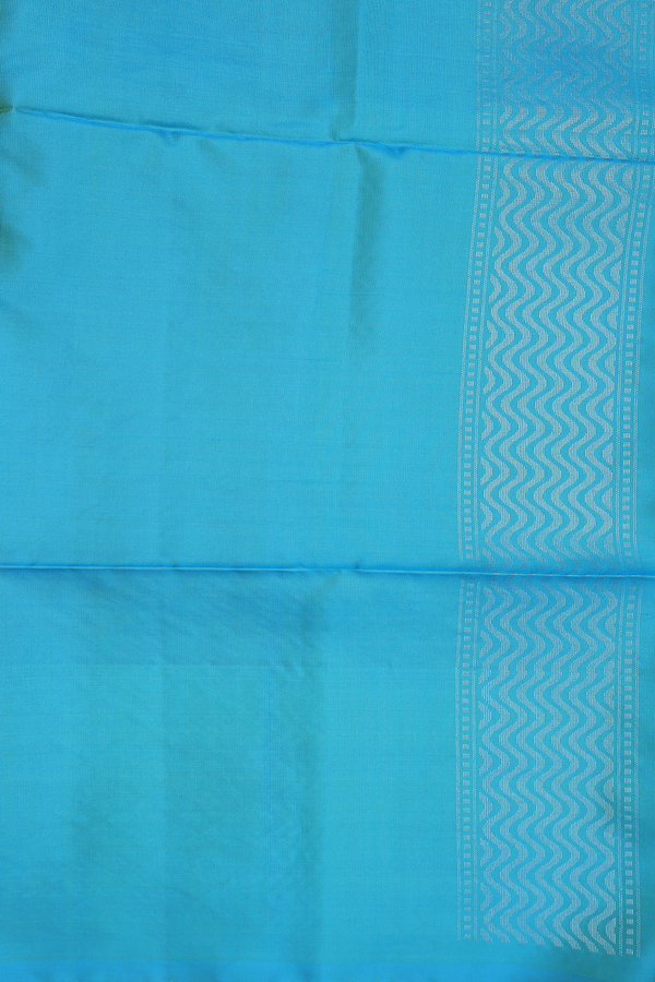 Soft Silk Saree In Parrot Green With Zari Buttas