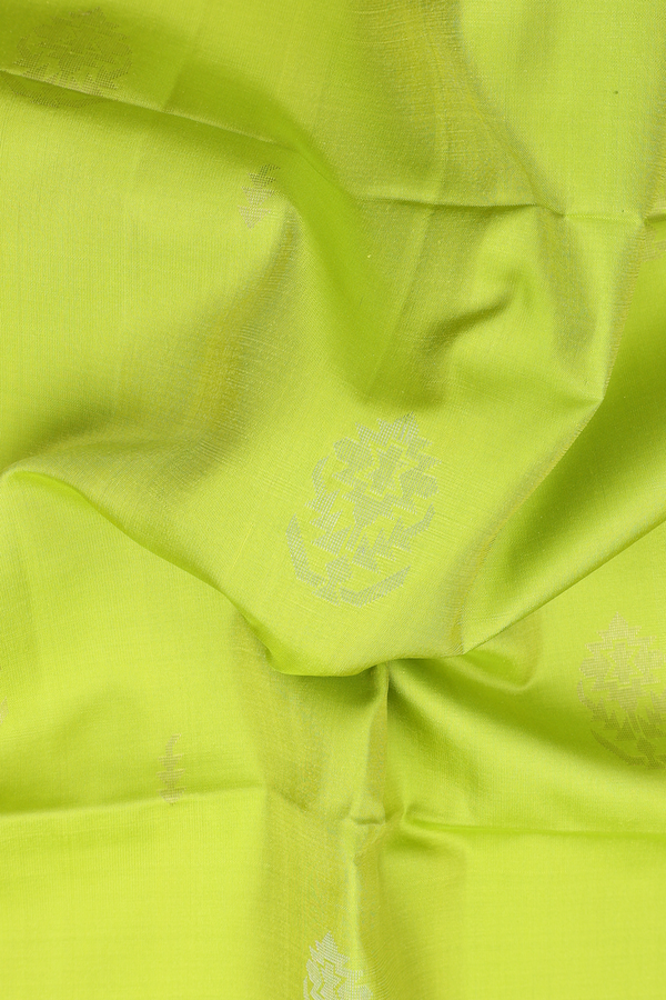 Soft Silk Saree In Lime Green With Zari Buttas