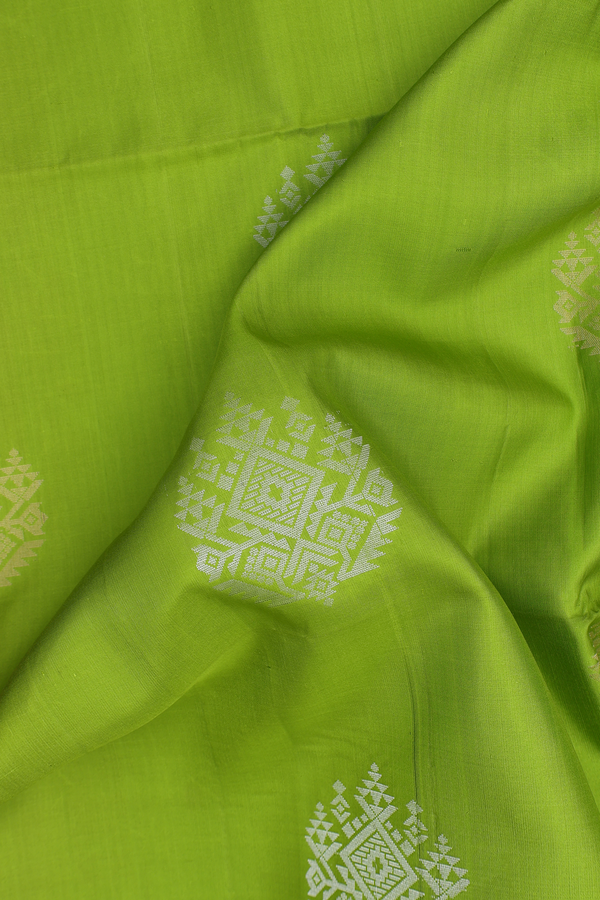 Soft Silk Saree In Lime Green With Zari Motifs