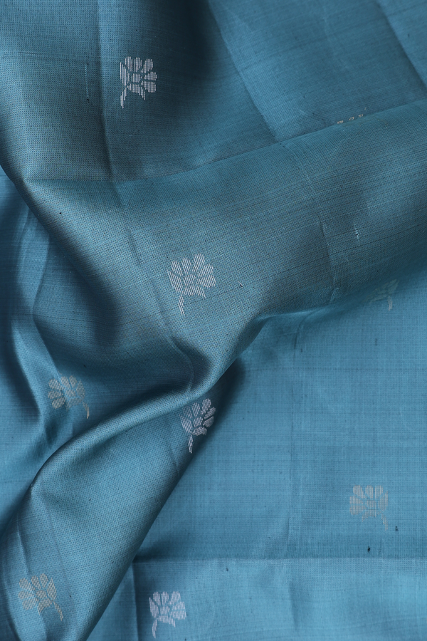 Soft Silk Saree In Turkish Blue With Floral Buttas