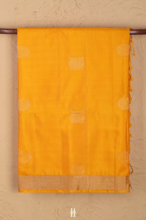 Soft Silk Saree In Mango Yellow With Peacock Buttas