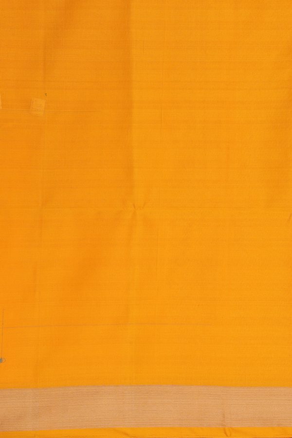 Soft Silk Saree In Mango Yellow With Peacock Buttas