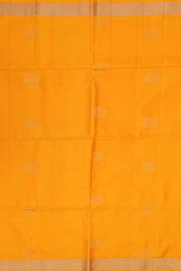 Soft Silk Saree In Mango Yellow With Peacock Buttas