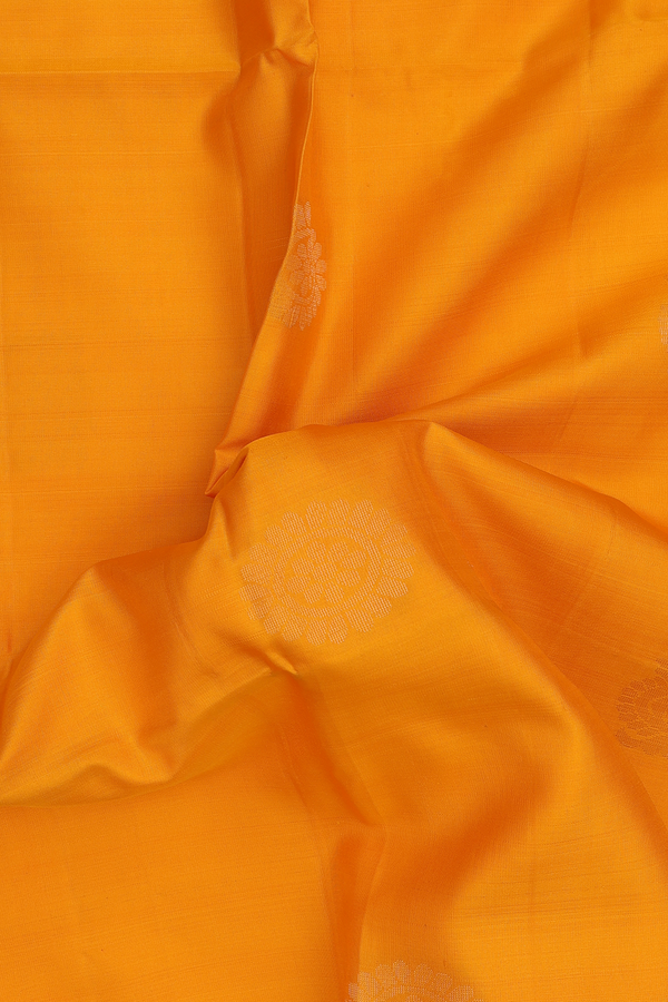 Soft Silk Saree In Mango Yellow With Peacock Buttas