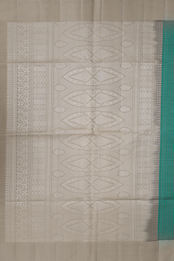 Soft Silk Saree In Pine Green Along Checks With Buttas