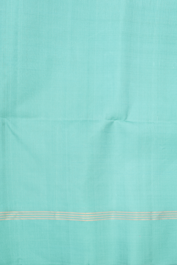 Soft Silk Saree In Tiffany Blue With Kolam Buttas