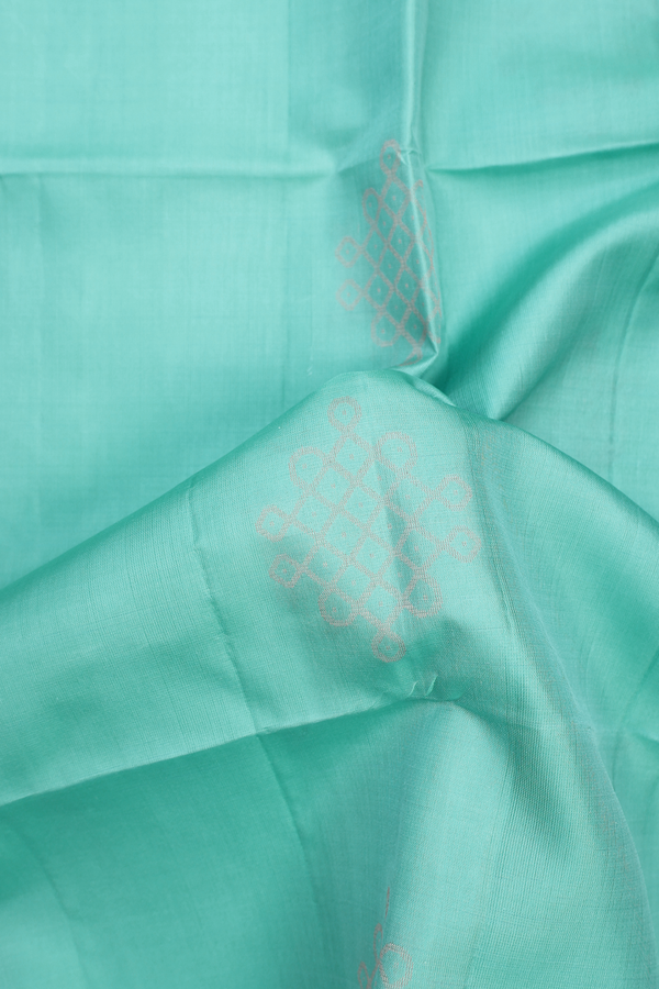Soft Silk Saree In Tiffany Blue With Kolam Buttas