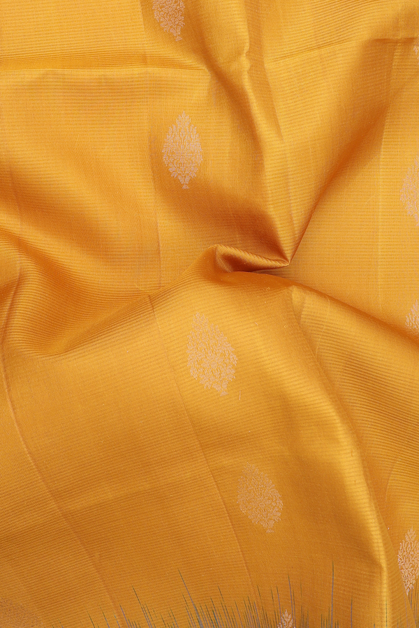 Soft Silk Saree In Saffron Yellow With Zari Buttas