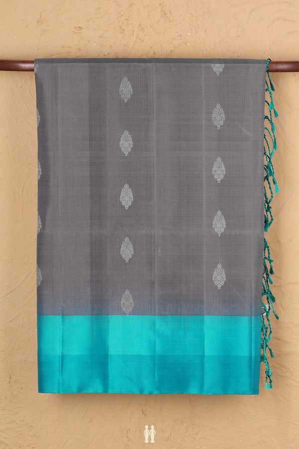 Soft Silk Saree In Grey With Zari Buttas
