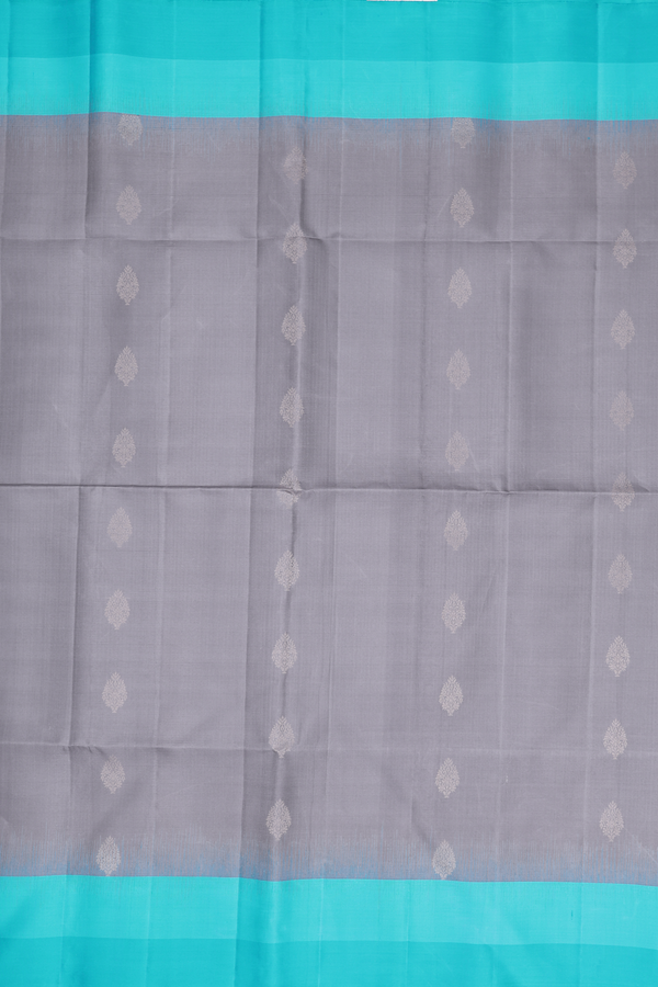 Soft Silk Saree In Grey With Zari Buttas