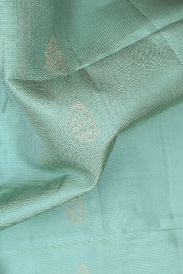 Soft Silk Saree In Dusty Green With Zari Buttas