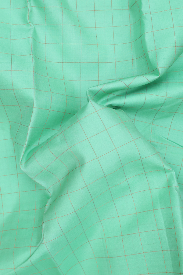 Kanchipuram Silk Saree In Green With Checks Design