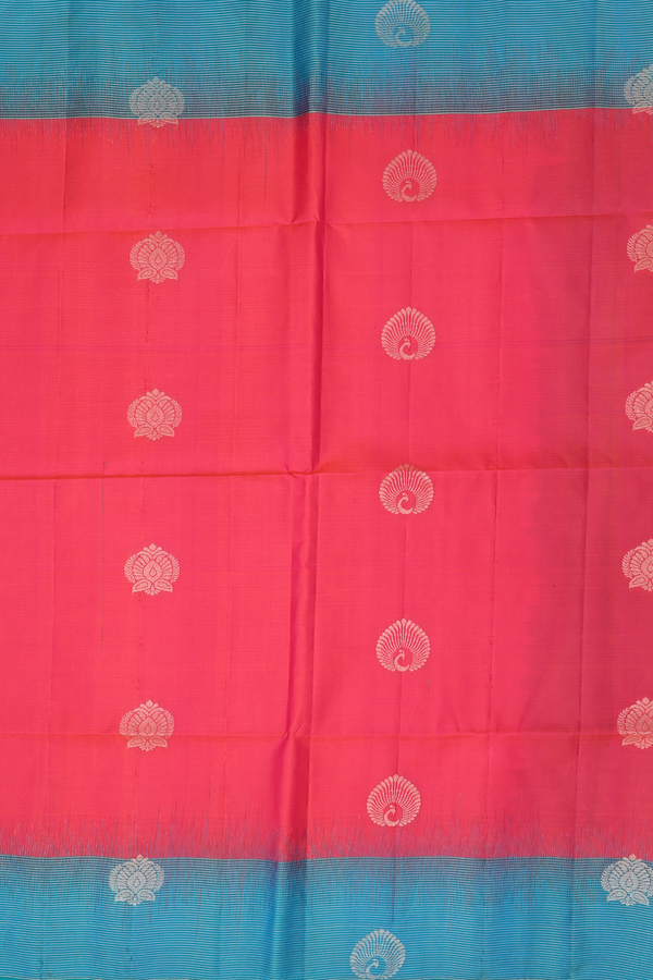 Soft Silk Saree In Coral Pink With Peacock Buttas