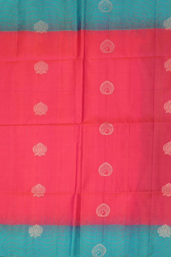 Soft Silk Saree In Coral Pink With Peacock Buttas