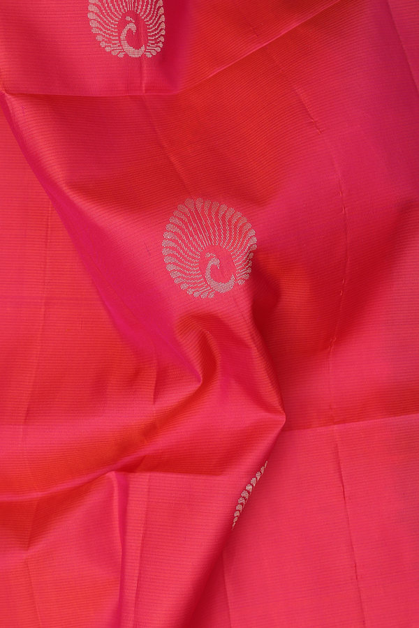 Soft Silk Saree In Coral Pink With Peacock Buttas